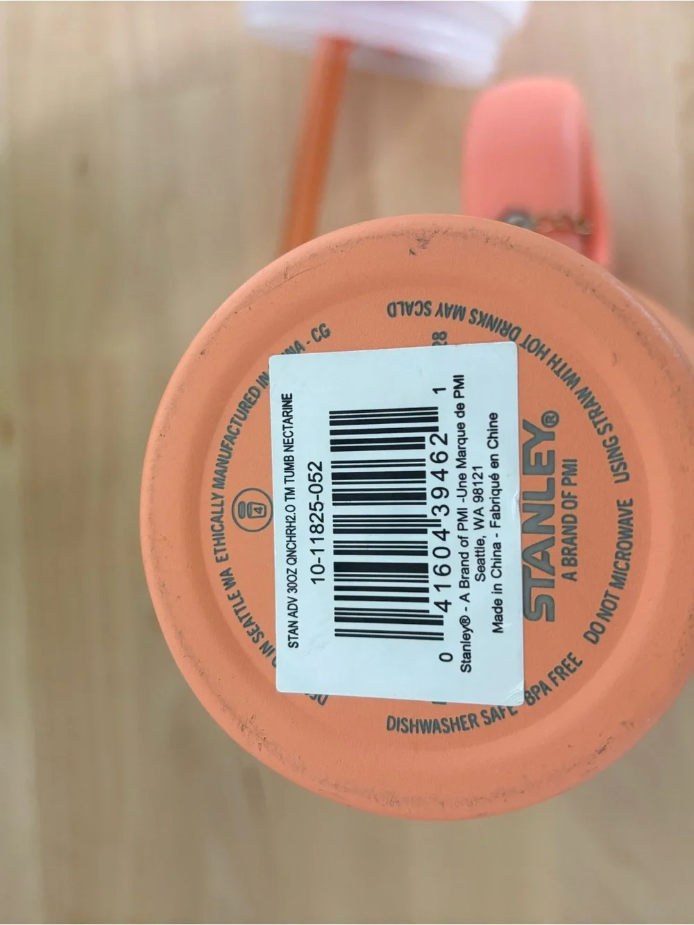Stanley Coral Orange Travel Mug with Handle and Reusable Straw